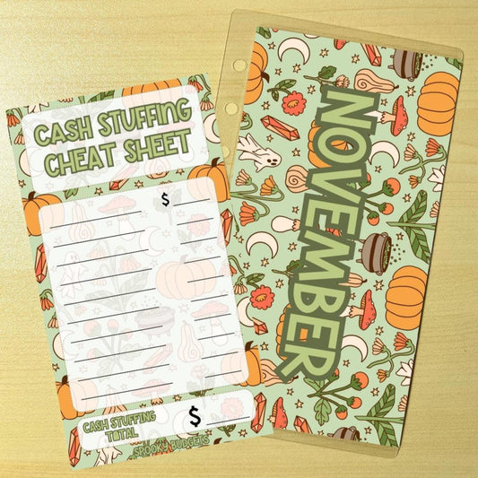 May include: Cash stuffing cheat sheet and November calendar printable inserts.  The cheat sheet has lines for listing expenses and calculating totals. The calendar features a light green background with autumnal illustrations including pumpkins, mushrooms, and stars. Both are designed for personal finance organization and fall-themed planning.