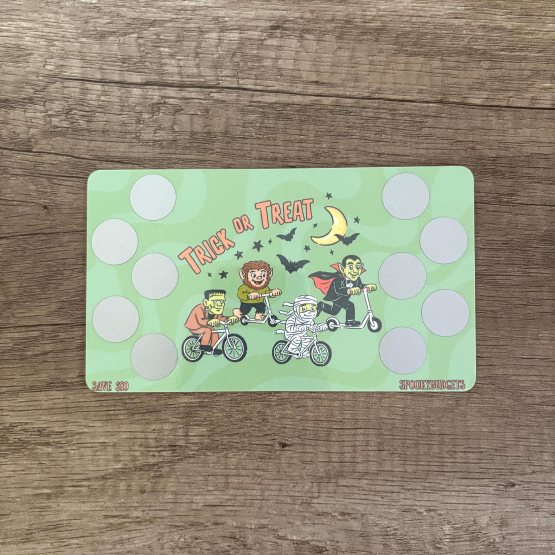 Trick or Treat Monsters Scratch & Save Challenge A6 Laminated 50,80Total Savings w/ Envelope Add on